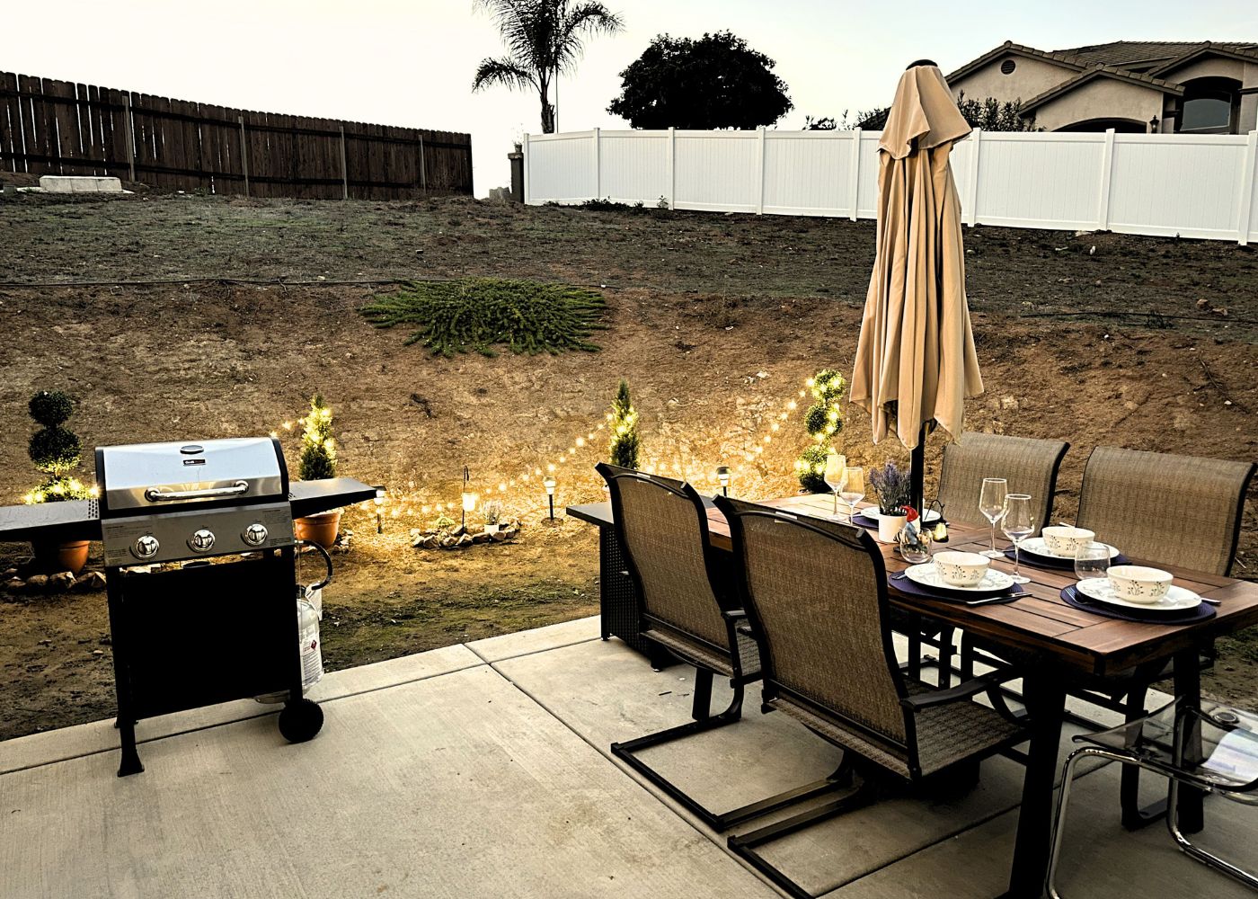 Outdoor dining and grill area at Haven